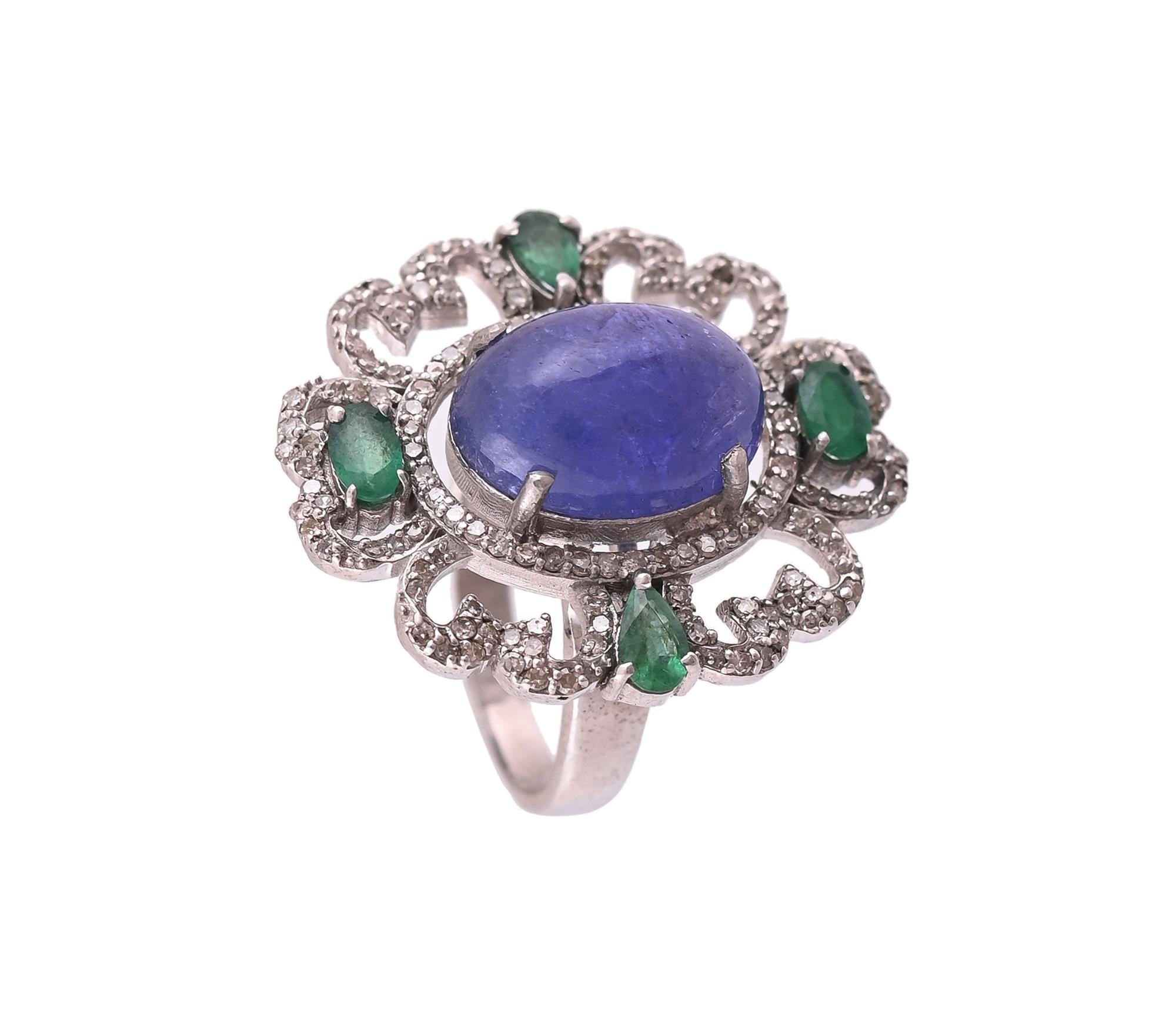 Beautiful Tanzanite & Multiple Emerald Natural Gemstones with Diamonds Around Oval Shape